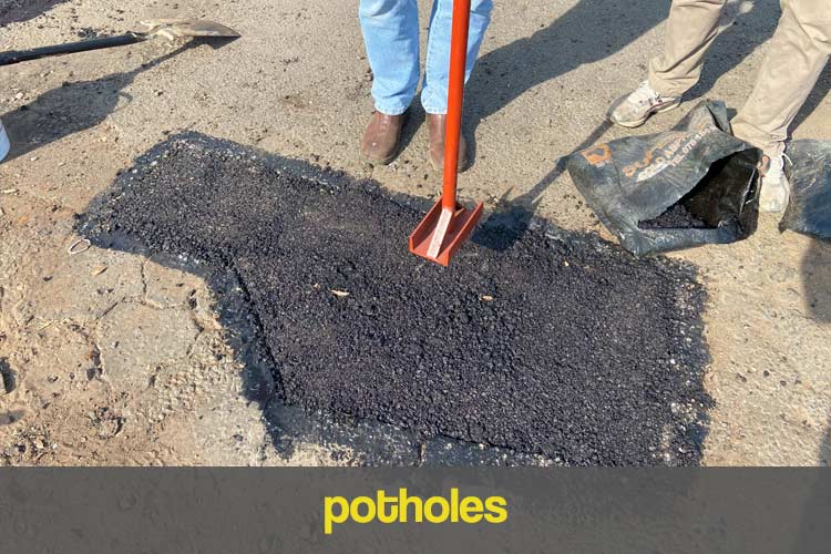 potholes-button-2